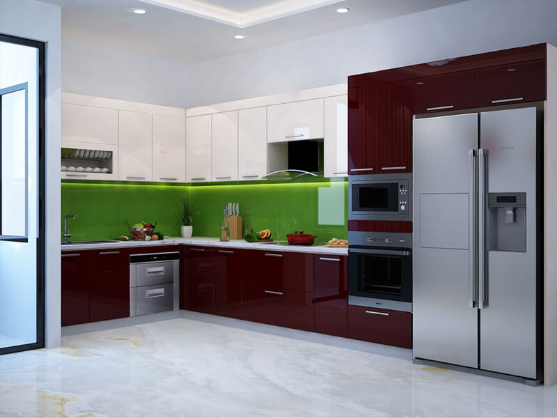 Phòng bếp đẹp với tủ bếp L và kính ốp bếp xanh non